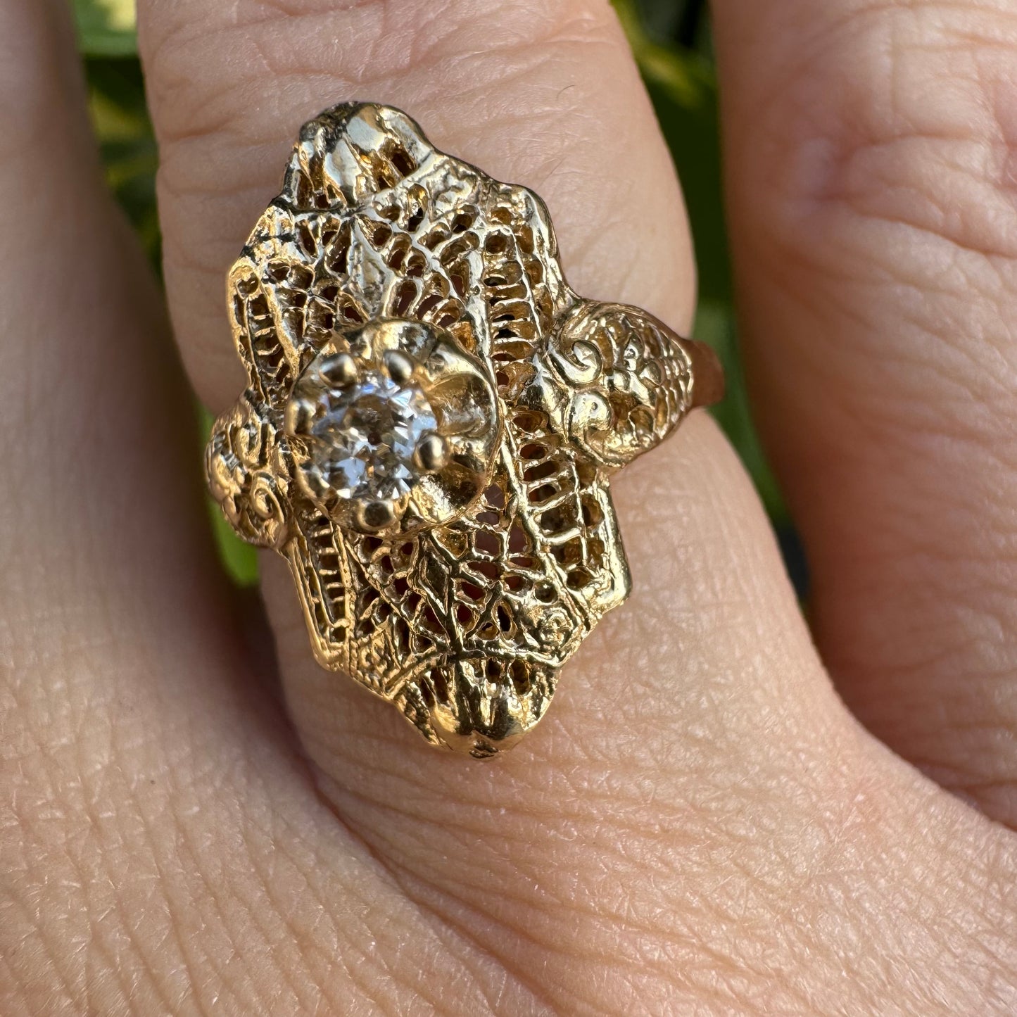 14K gold filigree ring set with an old-cut Diamond