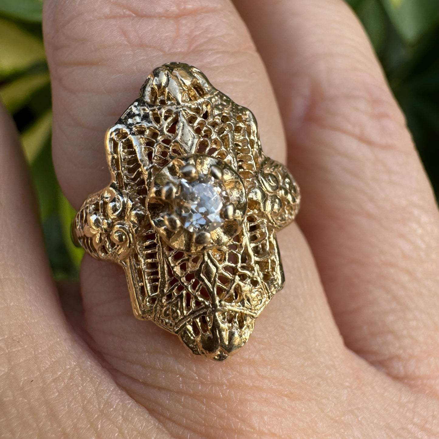 14K gold filigree ring set with an old-cut Diamond