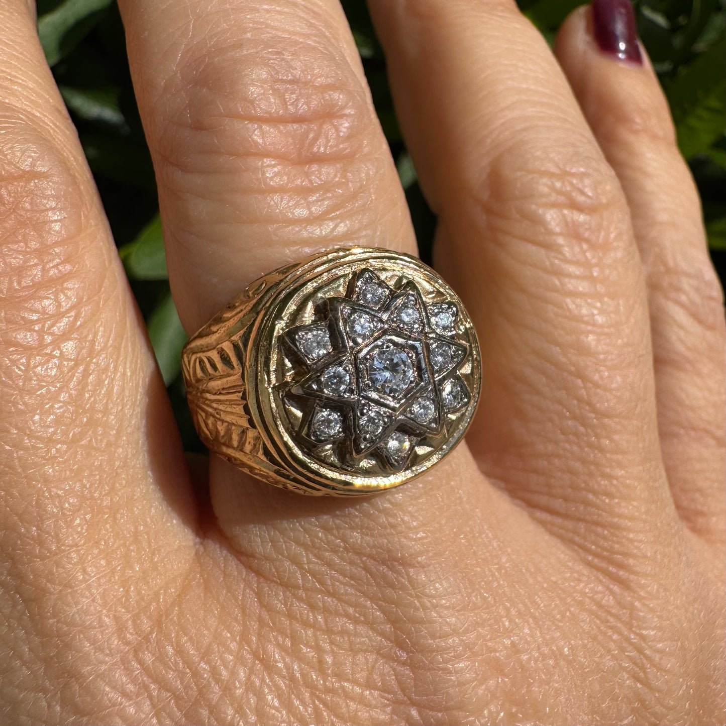 18K gold ring set with a dazzling double Star of David motif, meticulously set with shimmering Diamonds