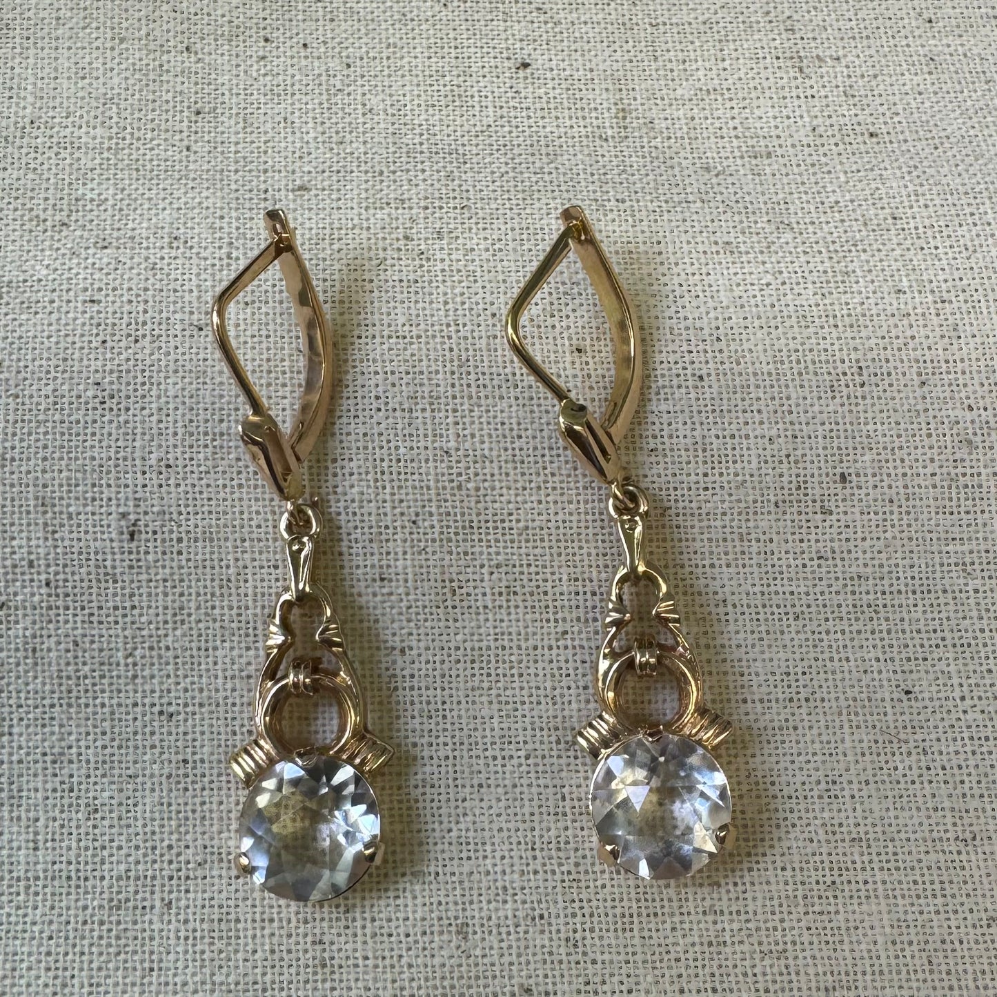 14K gold drop earrings crafted in warm gold, featuring old-cut clear stones