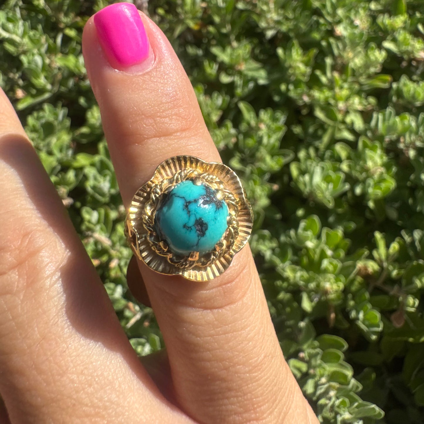 18K gold ring set with a unique Turquoise