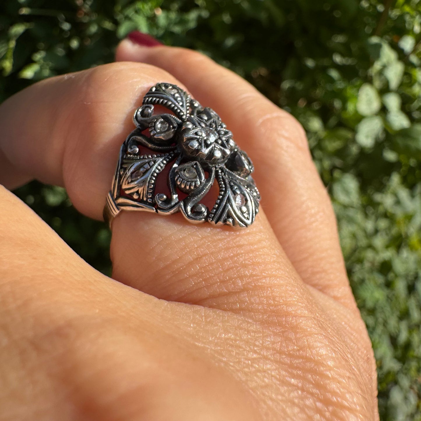 18K gold & silver ring with an intricate floral and leaf filigree design set with Diamonds