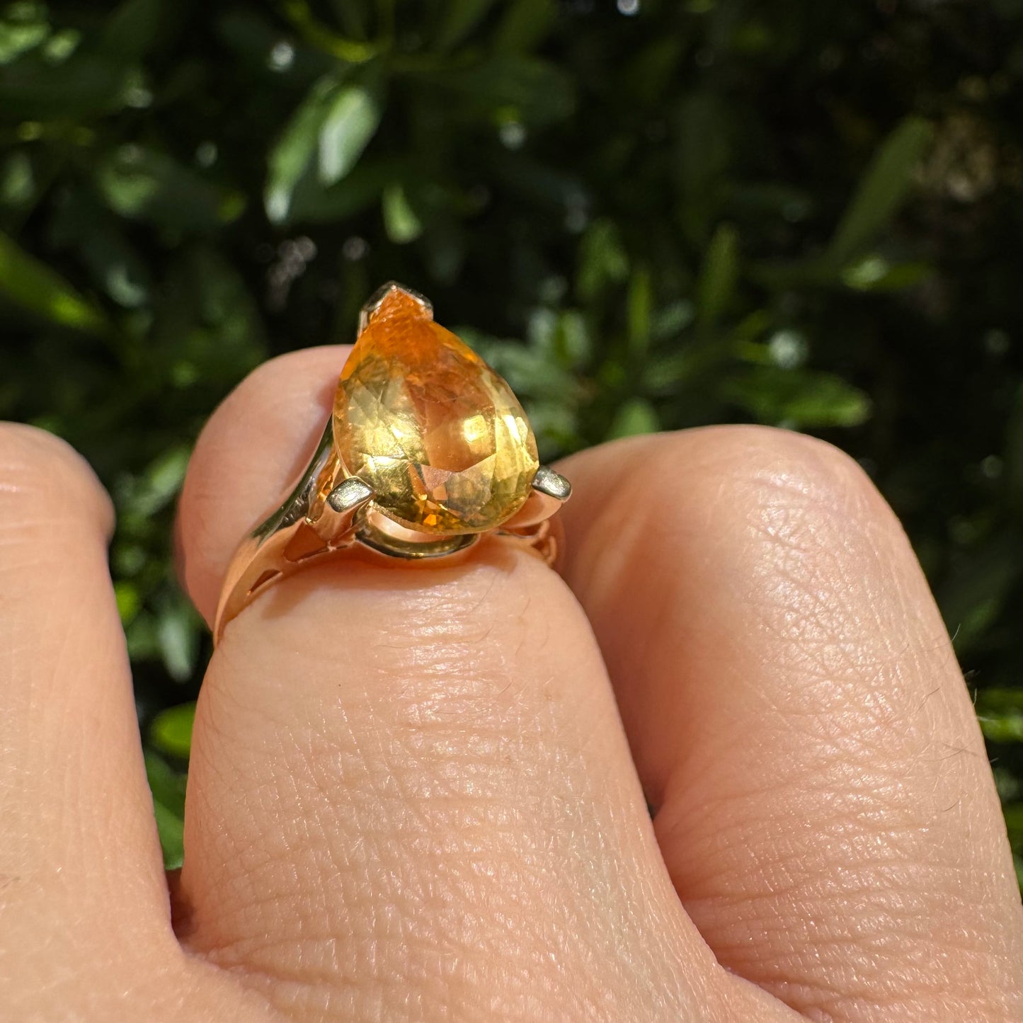 14K gold ring set with a large pear-shaped Citrine