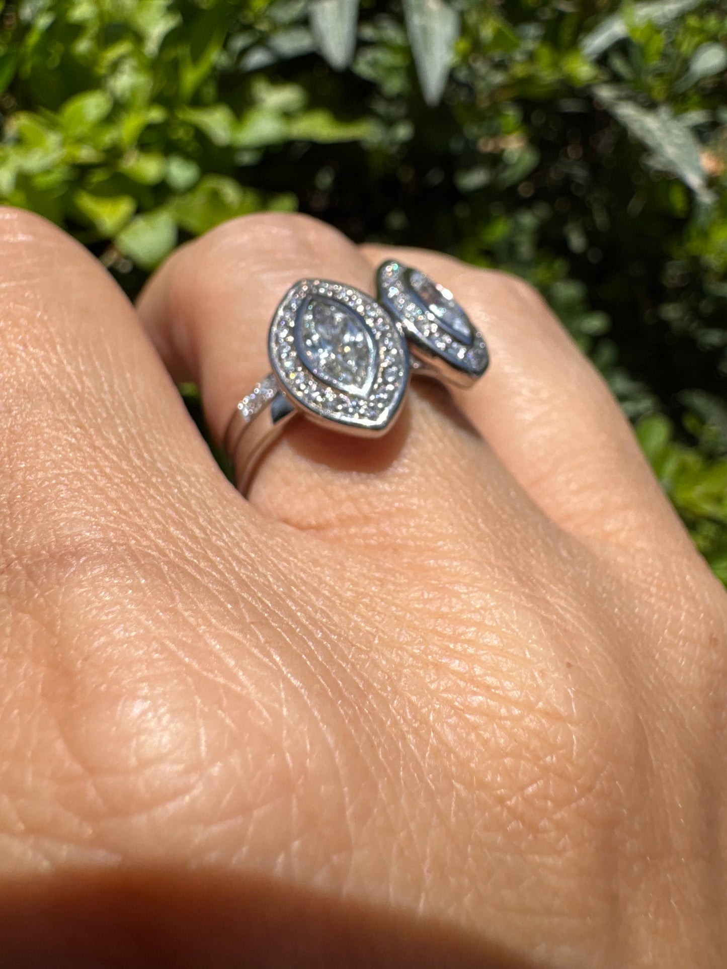 18K gold convertible ring set with two marquise-cut diamond halos that magnetically connect into a bold statement piece