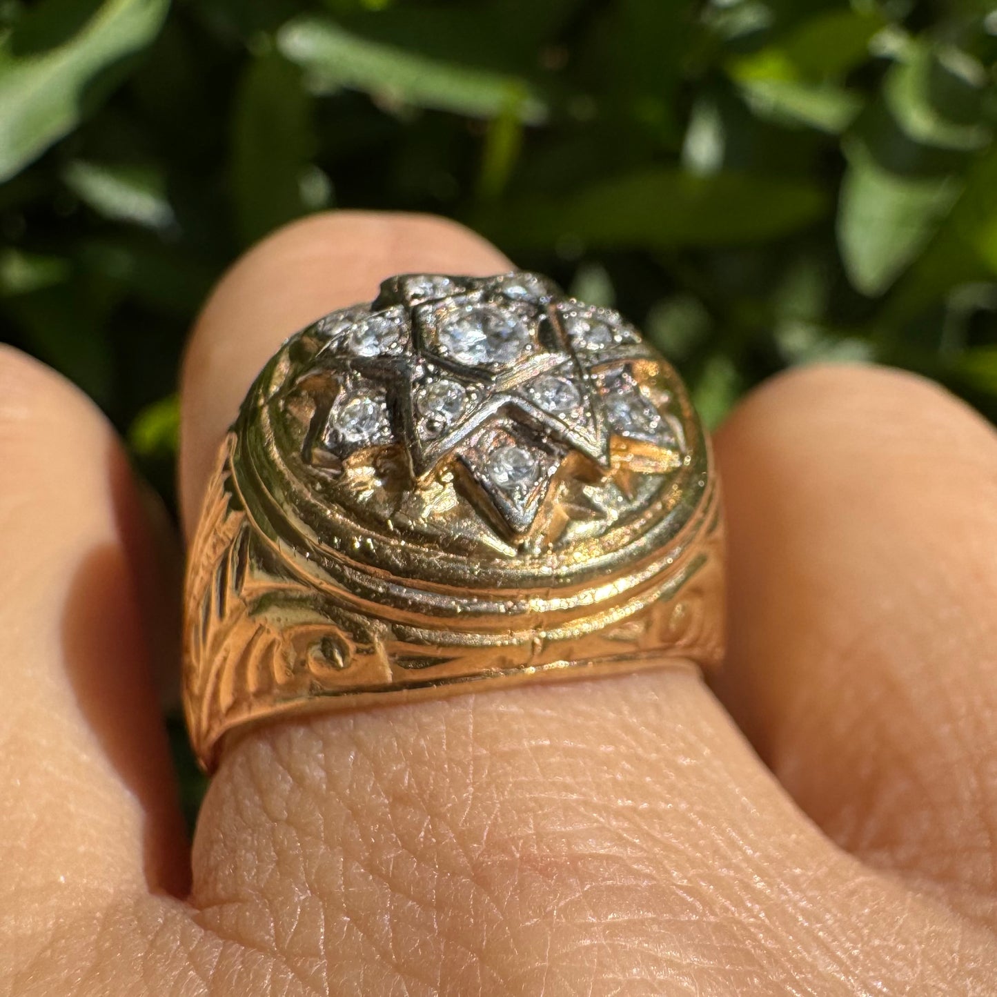 18K gold ring set with a dazzling double Star of David motif, meticulously set with shimmering Diamonds