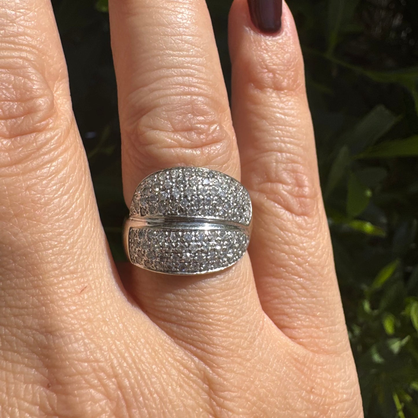 18K gold bold dome ring set with rows of brilliant pavé-set Diamonds