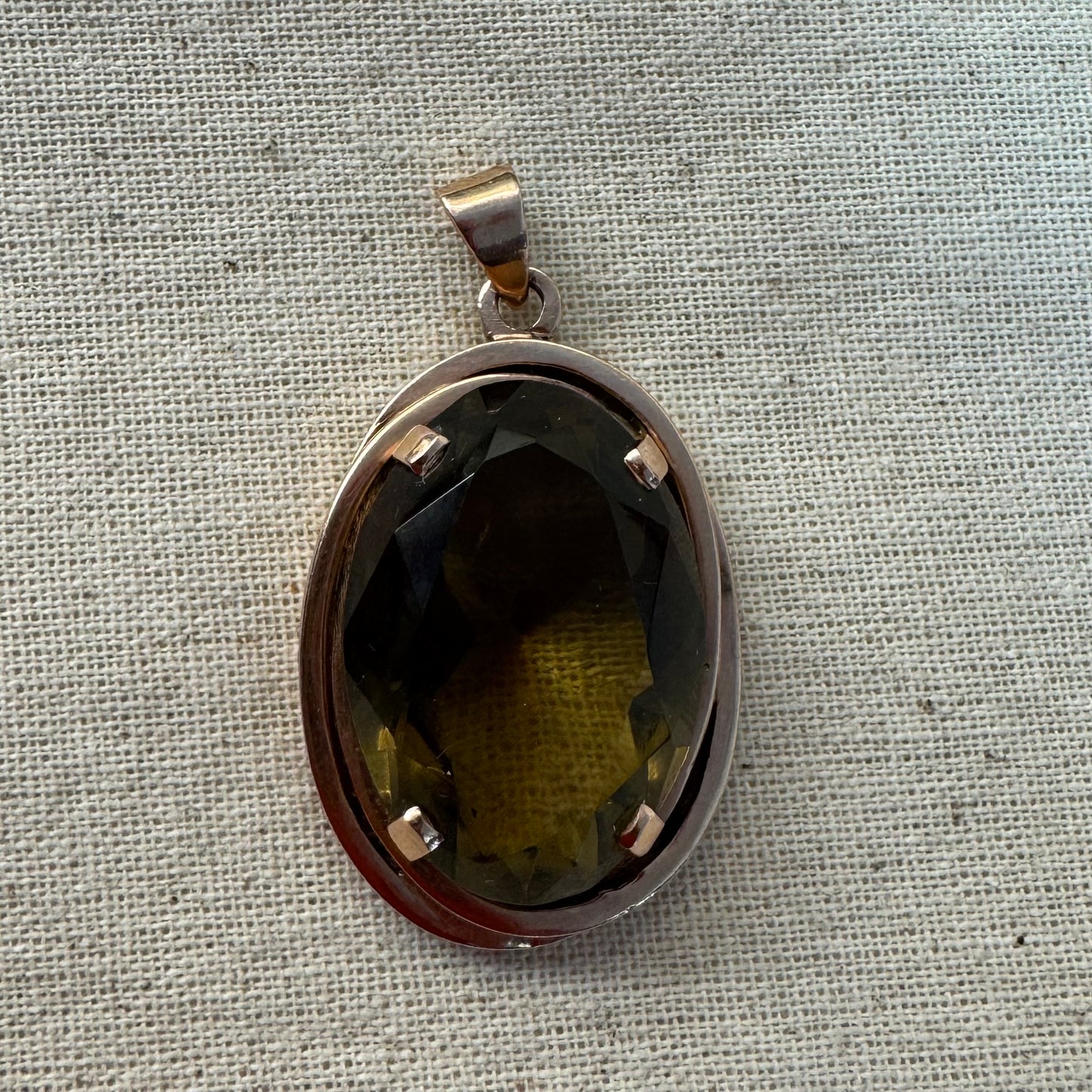 14K gold pendant set with a large oval-cut Smoky Quartz in a rare olive-green hue