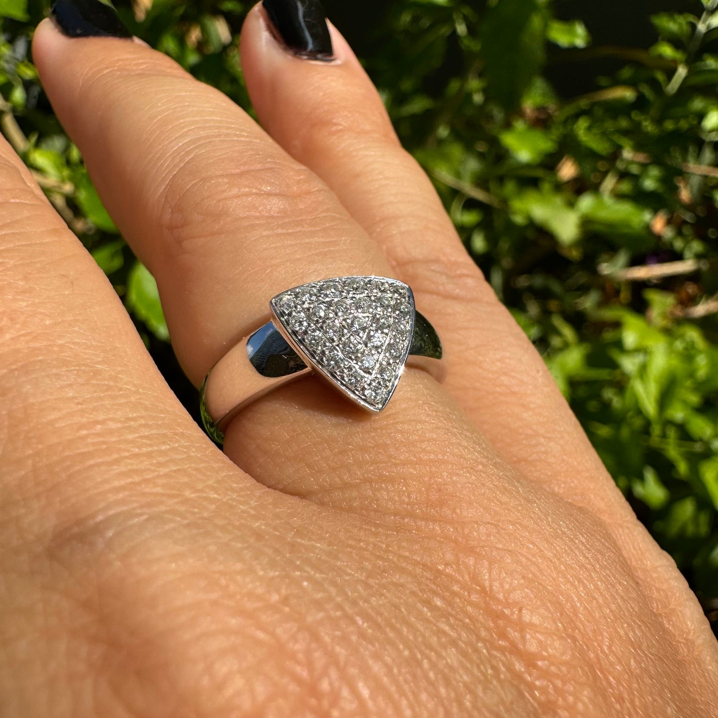 18K gold ring featuring a bold triangular design fully pavé-set with brilliant-cut Diamonds.