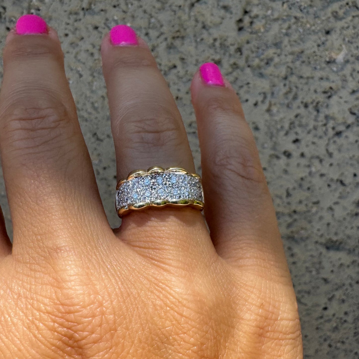 14K gold ring set with center pavé of sparkling Diamonds framed with softly waved gold edges