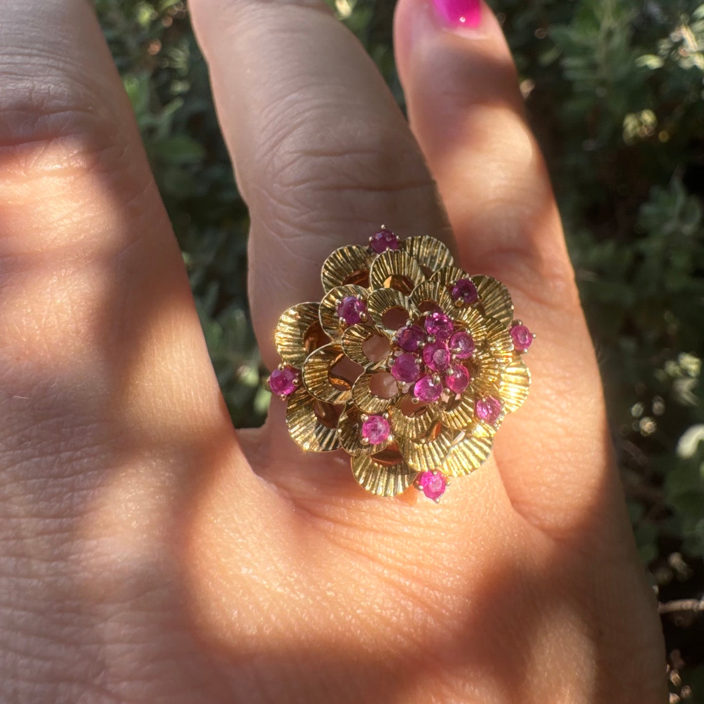 18K gold ring crafted in yellow gold, designed in a layered floral motif set with Rubies