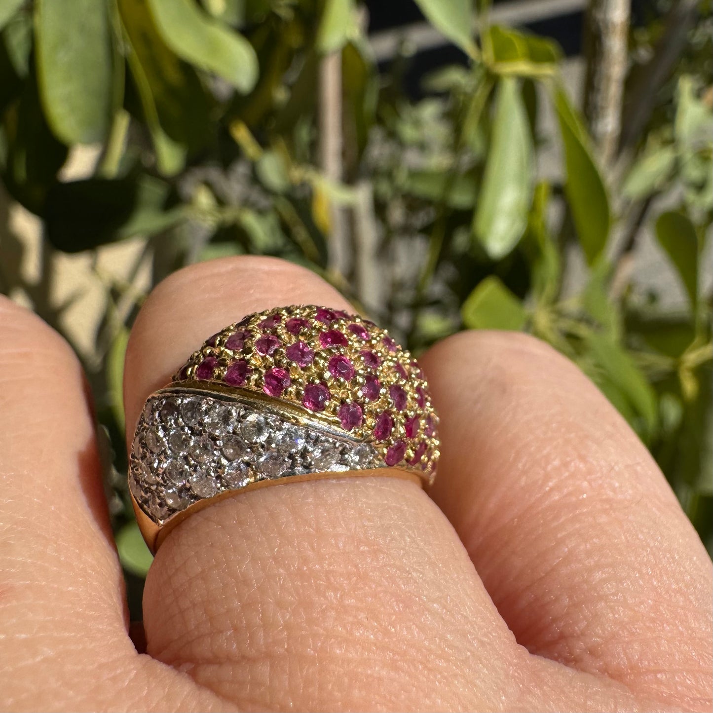 14K gold dome ring pavé-set with Diamonds and vivid Rubies in a striking two-tone design