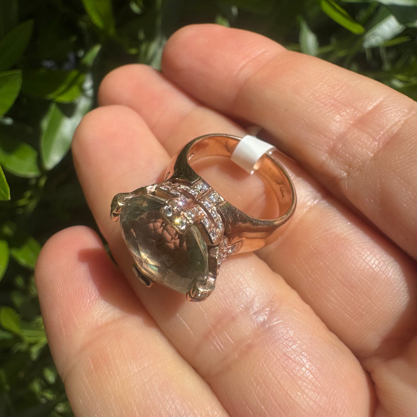 18K gold ring set with a stunning faceted Prasiolite, delicately accented with Diamonds on each prong