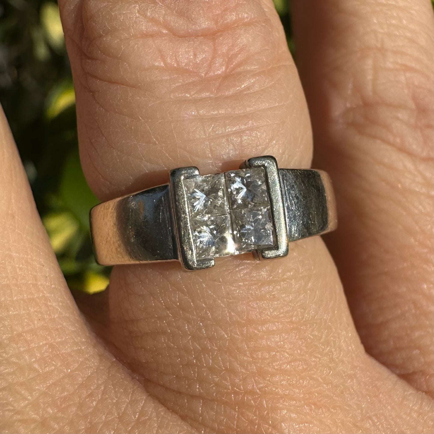 14K gold ring set with 4 square-cut Diamonds