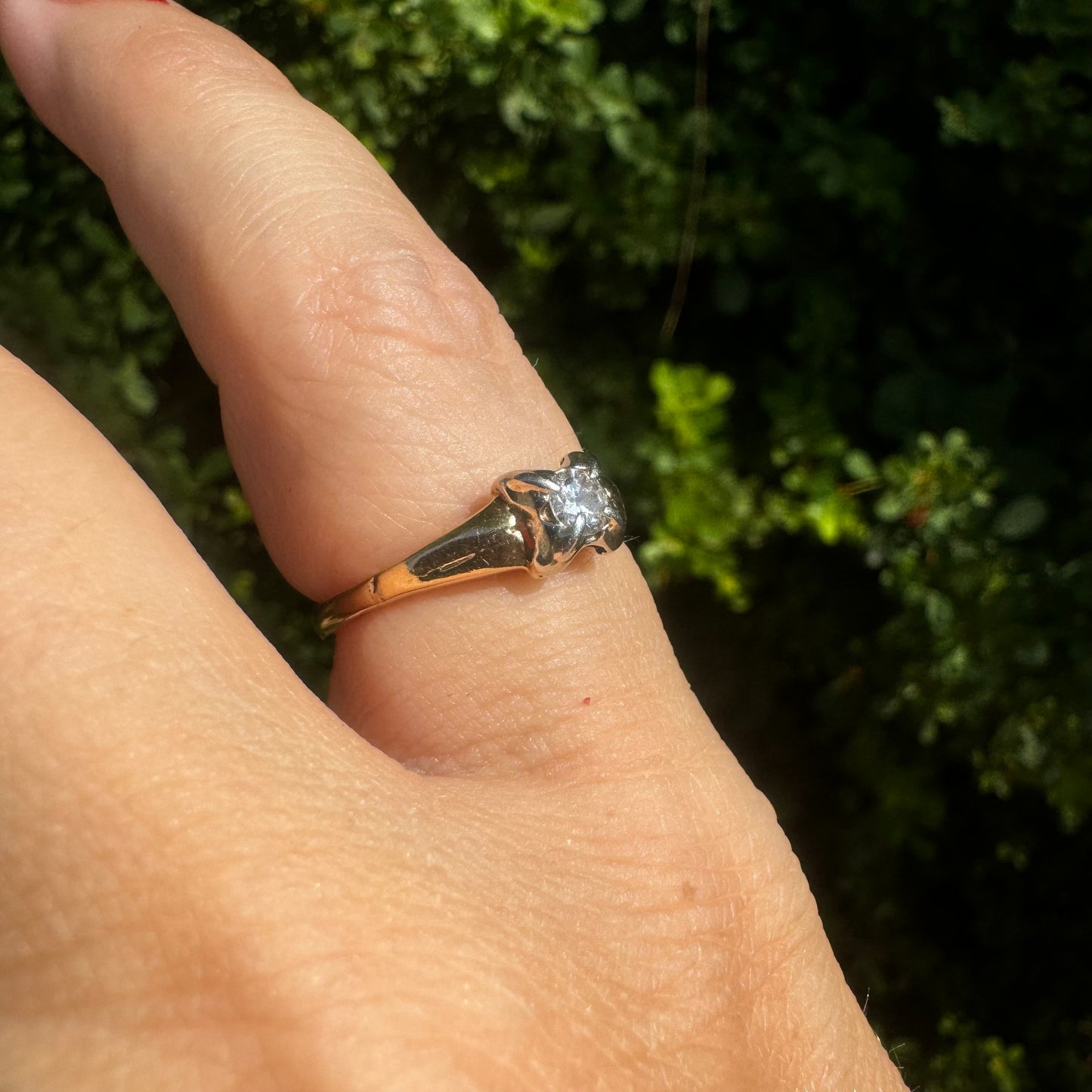 14K gold ring set with one center Diamond