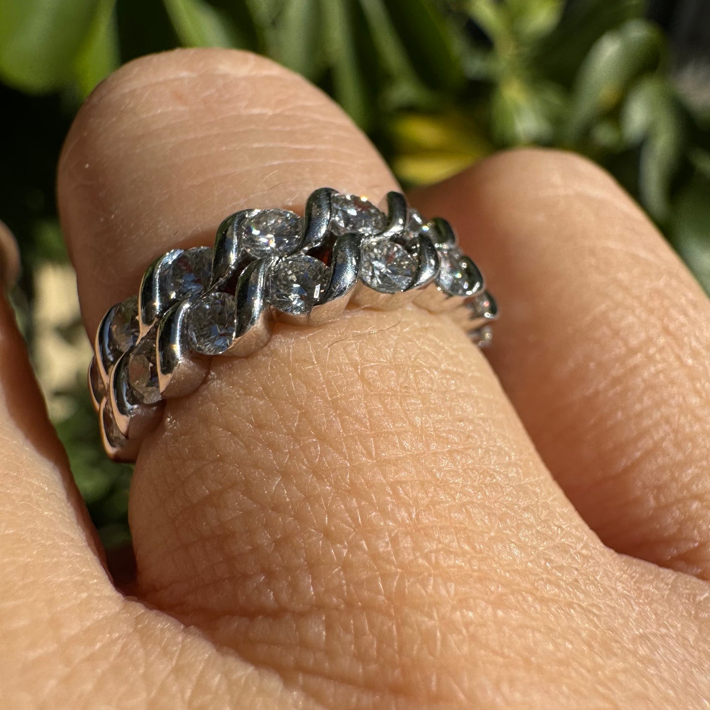 14K gold ring set with two rows of brilliant-cut Diamonds.