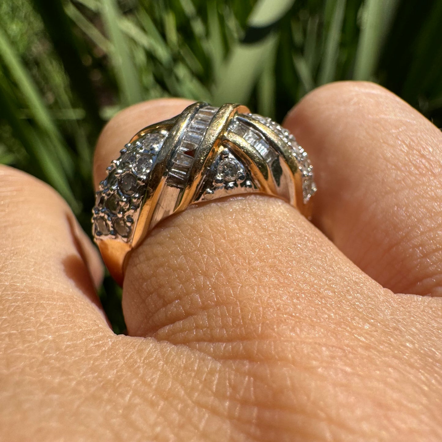 14K gold ring set with crisscrossed rows of baguette and round-cut Diamonds