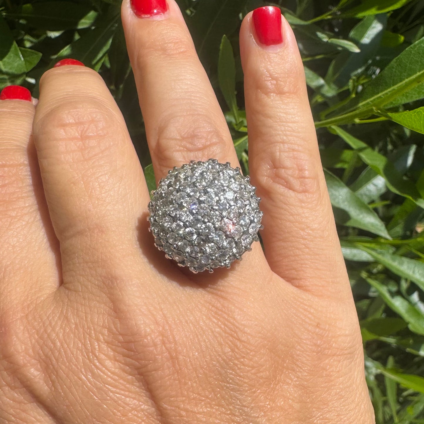 18K gold ring set with Diamonds in a bold pavé setting.