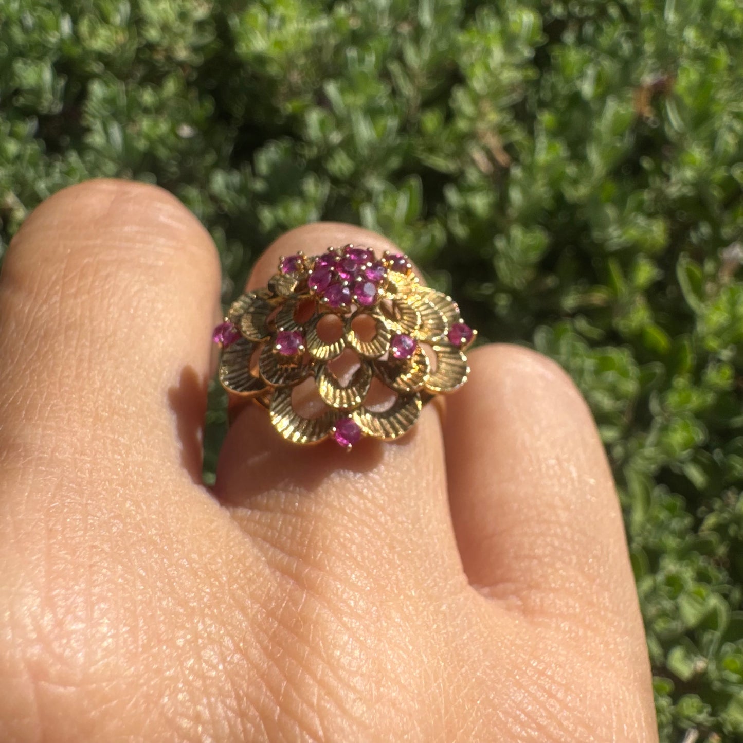 18K gold ring crafted in yellow gold, designed in a layered floral motif set with Rubies