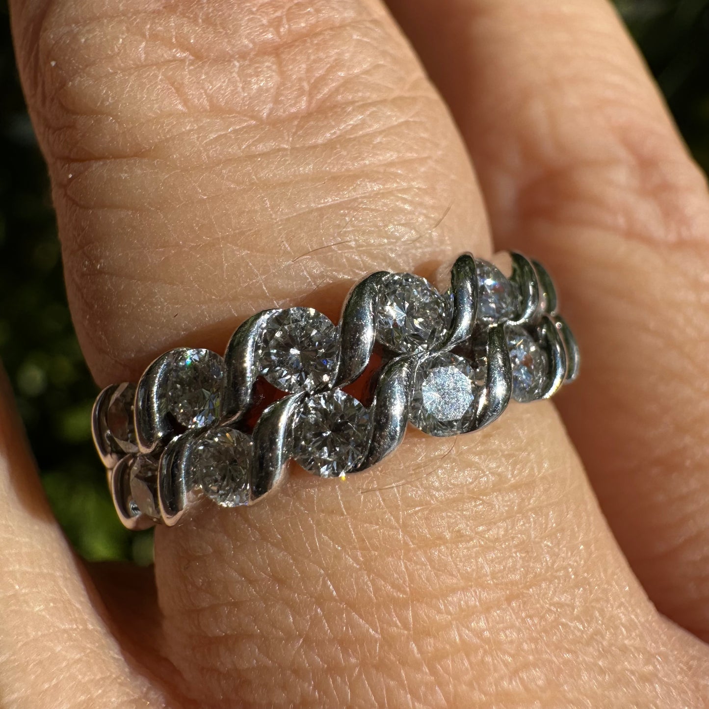 14K gold ring set with two rows of brilliant-cut Diamonds.