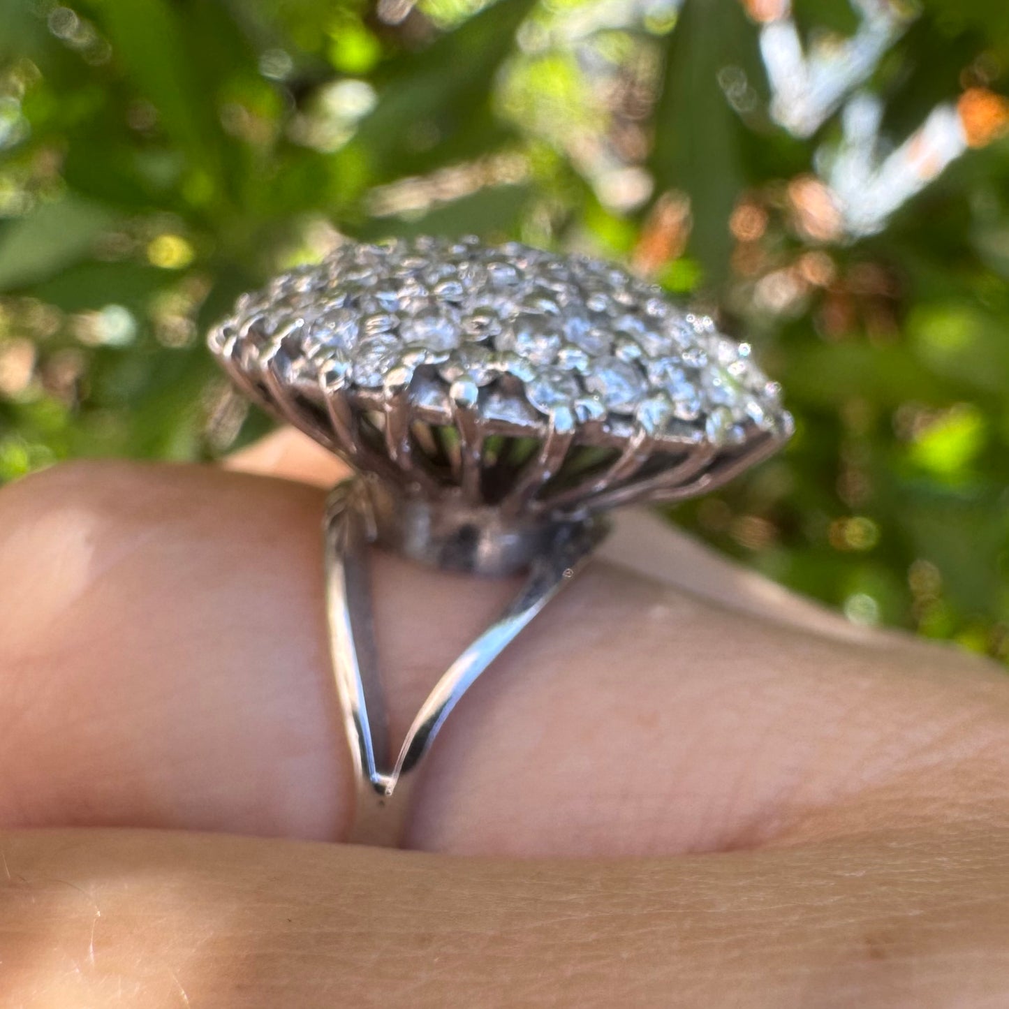 18K gold ring set with Diamonds in a bold pavé setting.