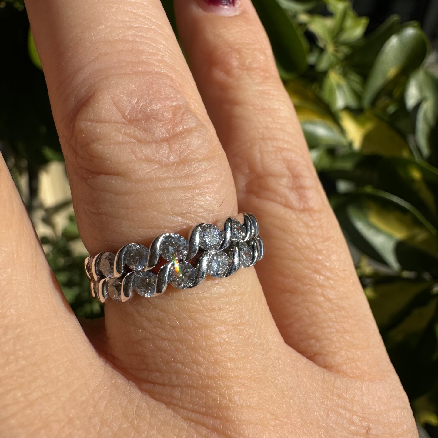 14K gold ring set with two rows of brilliant-cut Diamonds.