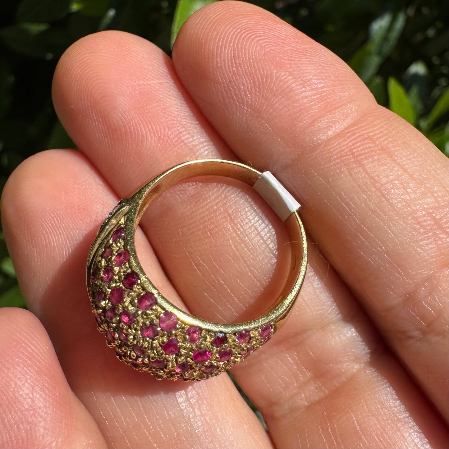 14K gold dome ring pavé-set with Diamonds and vivid Rubies in a striking two-tone design