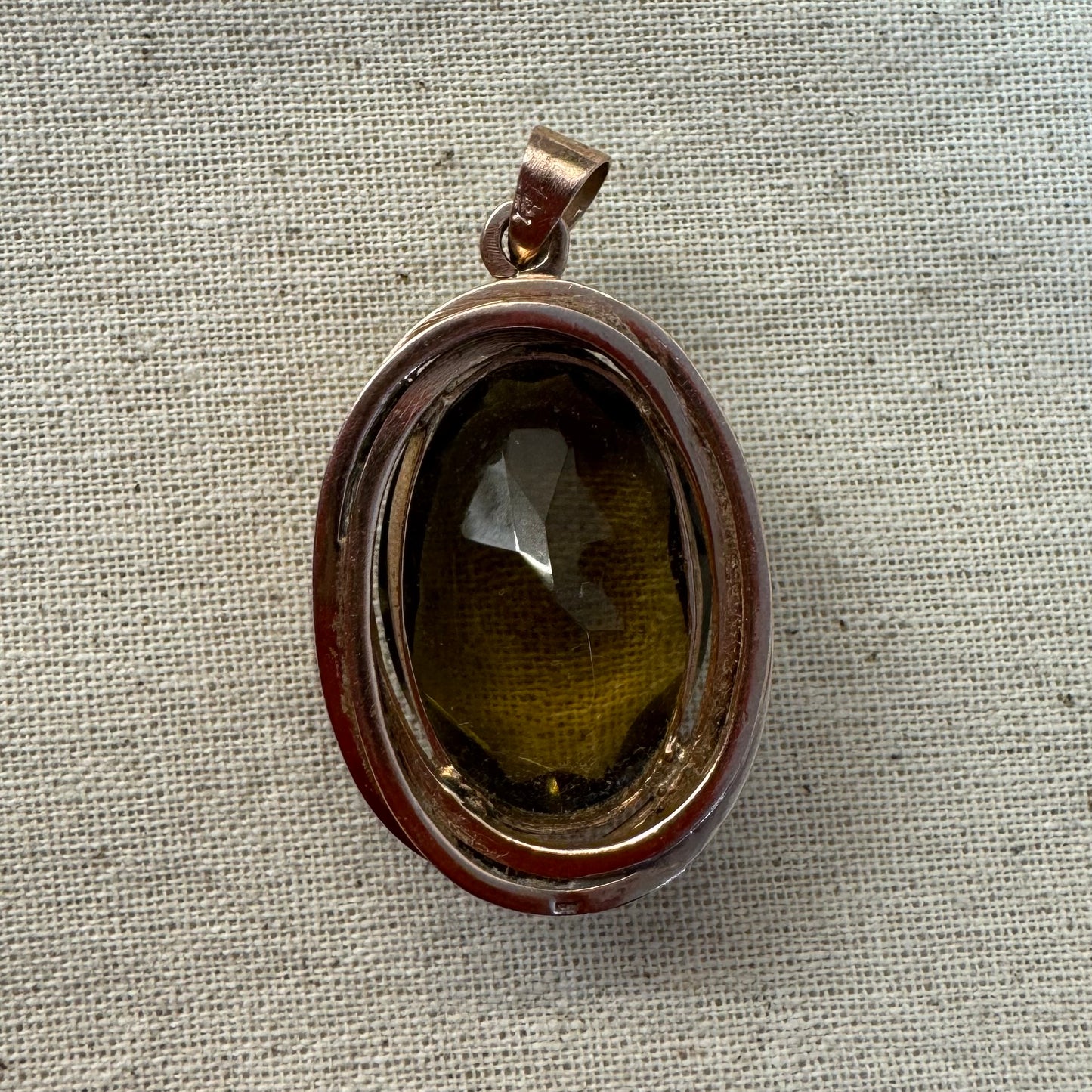 14K gold pendant set with a large oval-cut Smoky Quartz in a rare olive-green hue