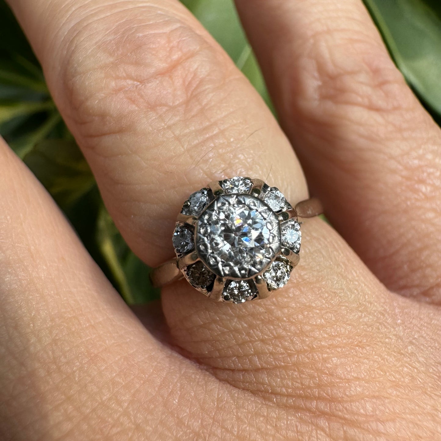 18K gold ring set with Diamonds in     a classic cluster-style