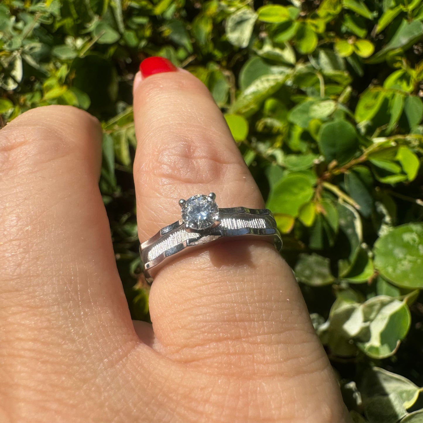 14K gold ring set with one center Diamond