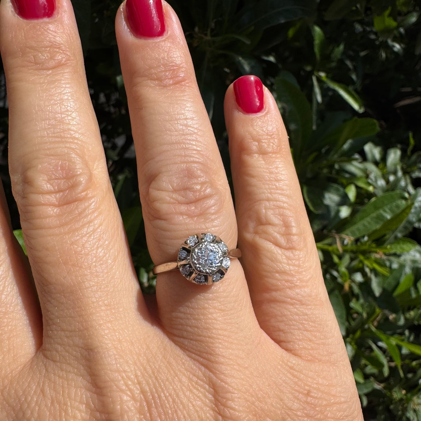 18K gold ring set with Diamonds in     a classic cluster-style