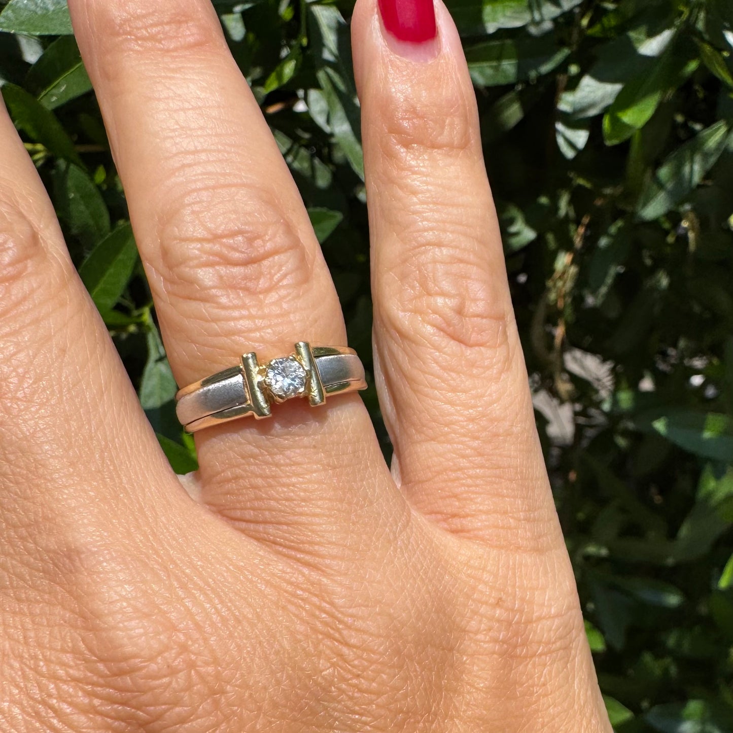 14K two-tone gold ring set with one center Diamond