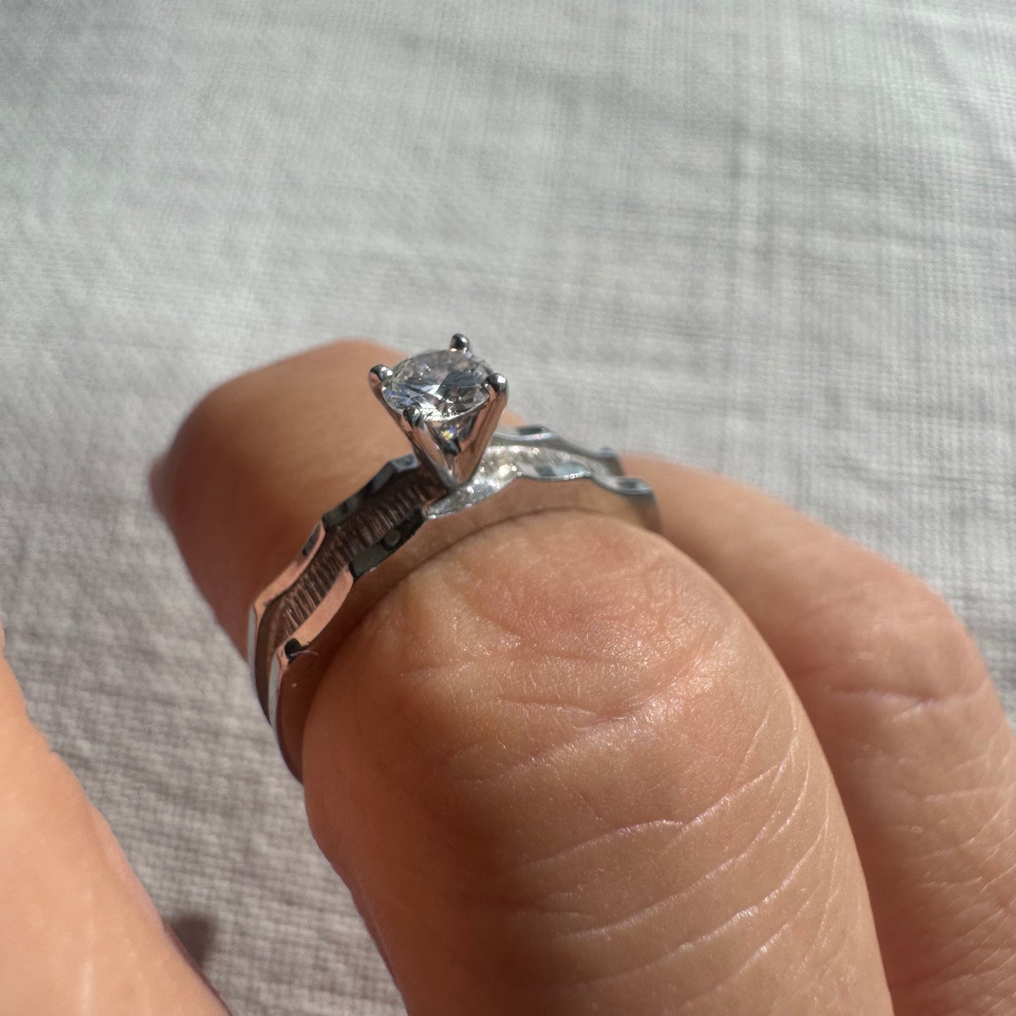 14K gold ring set with one center Diamond