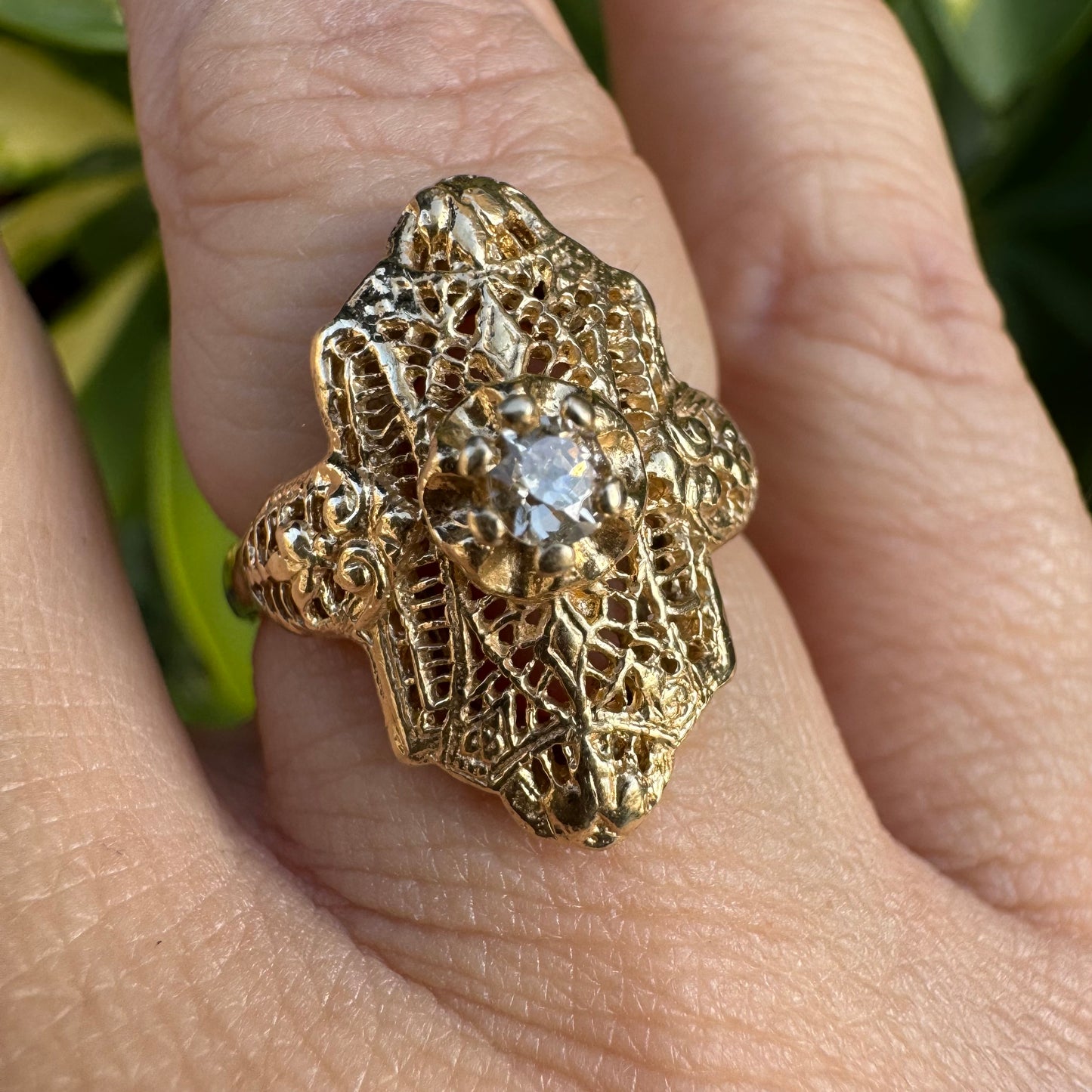 14K gold filigree ring set with an old-cut Diamond