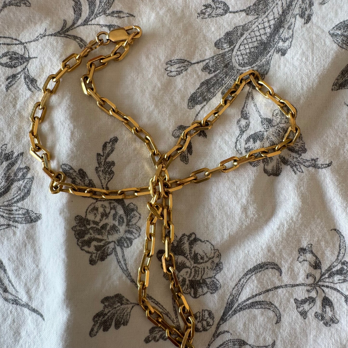 14K gold chain necklace featuring elegant elongated links with a polished finish.