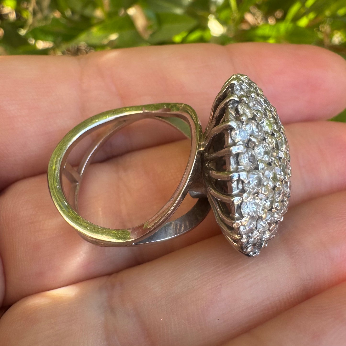 18K gold ring set with Diamonds in a bold pavé setting.