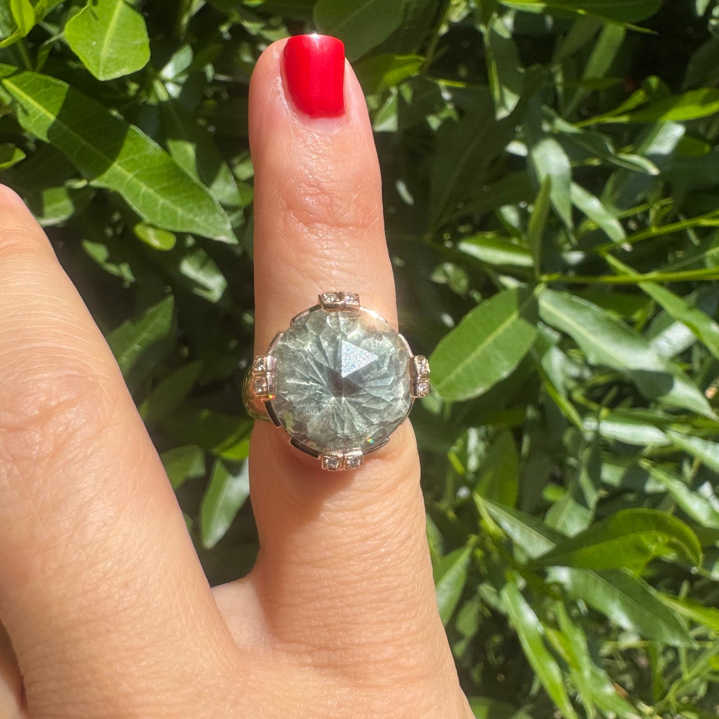 18K gold ring set with a stunning faceted Prasiolite, delicately accented with Diamonds on each prong