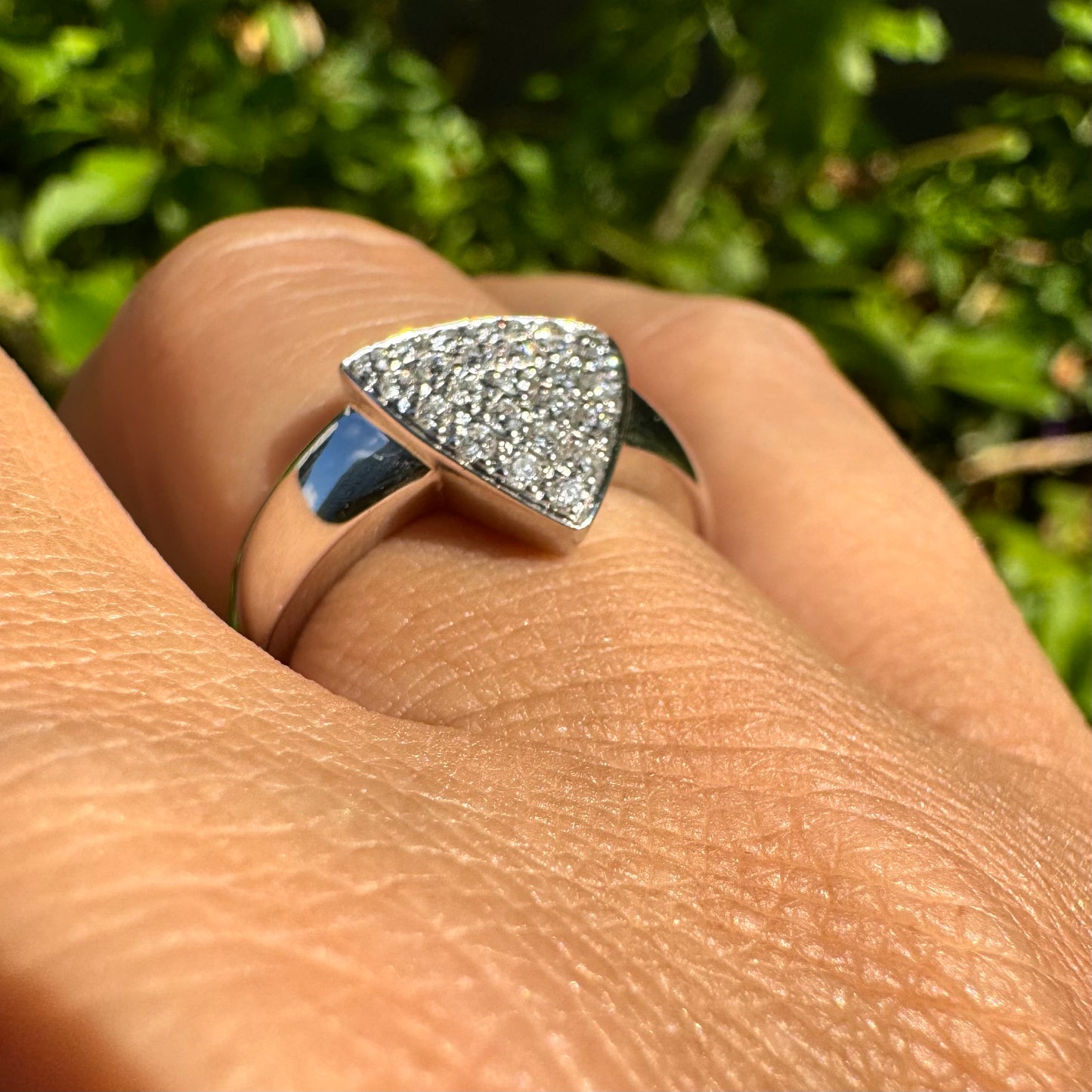 18K gold ring featuring a bold triangular design fully pavé-set with brilliant-cut Diamonds.