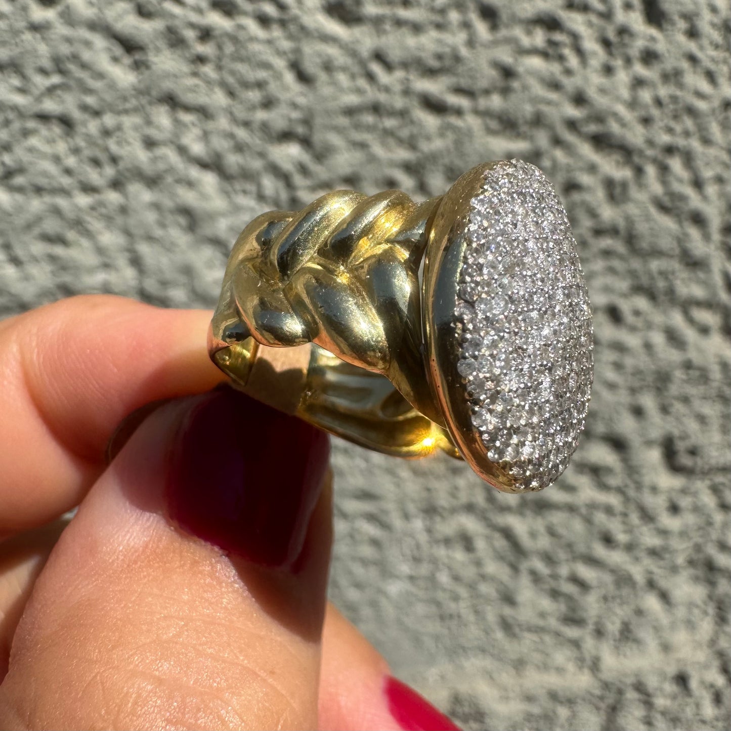 18K gold ring set with a dazzling dome of pavé-set diamonds