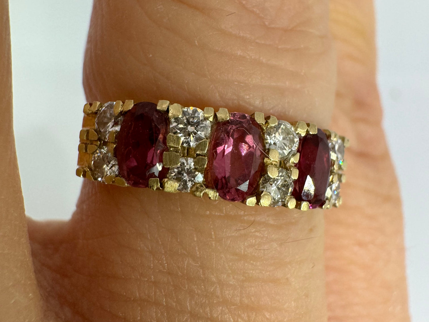 14K gold ring set with oval Pink Tourmalines and round brilliant-cut Diamonds