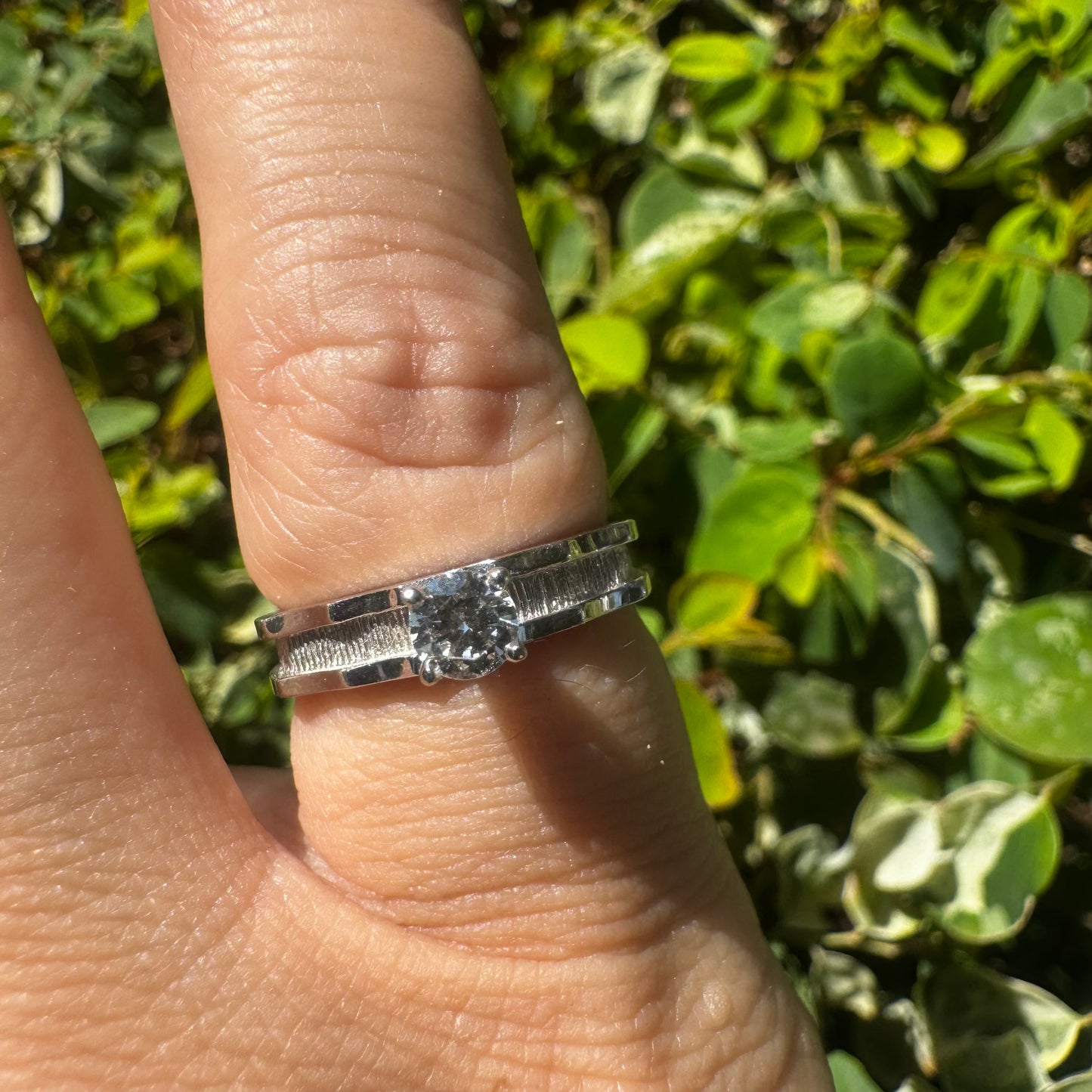 14K gold ring set with one center Diamond