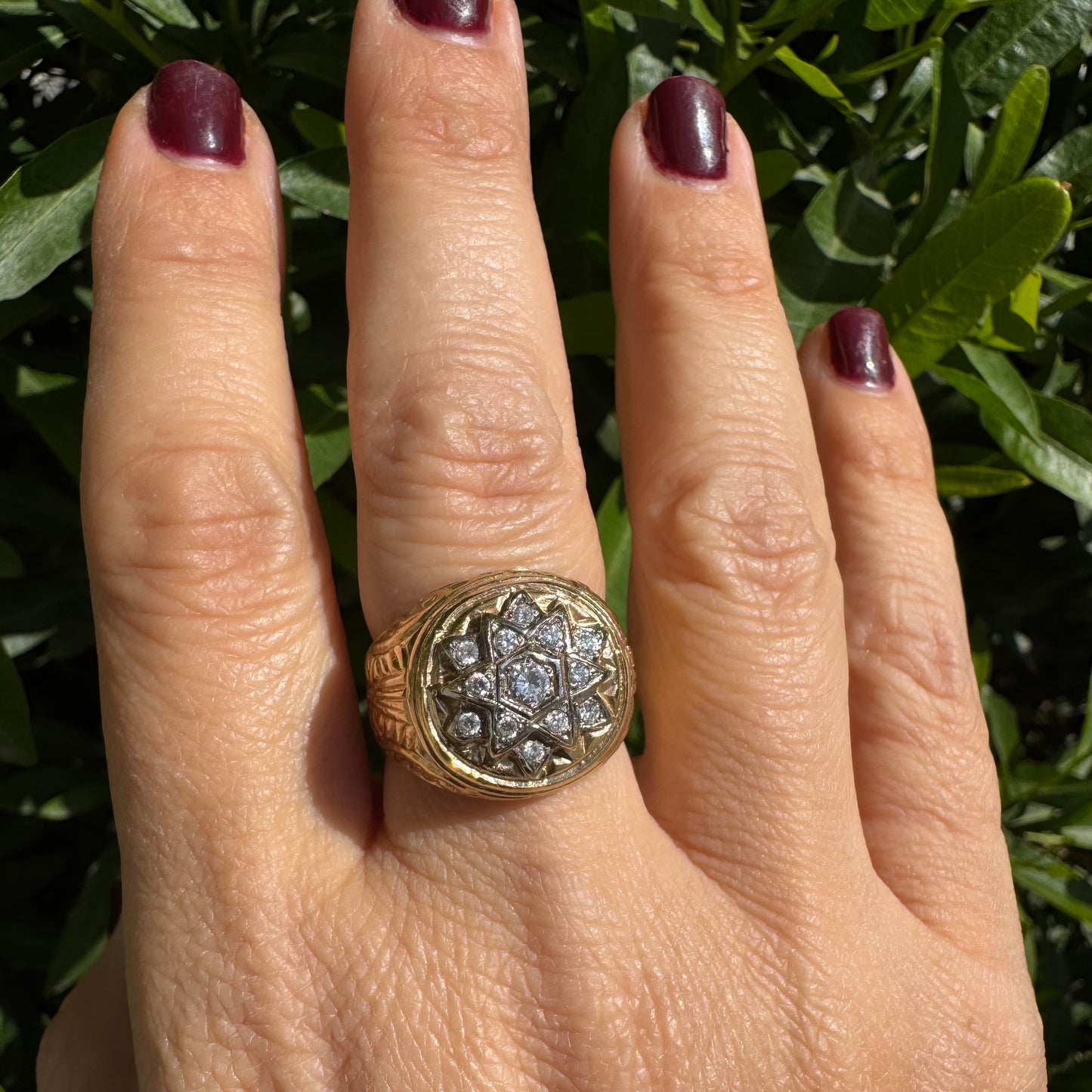 18K gold ring set with a dazzling double Star of David motif, meticulously set with shimmering Diamonds