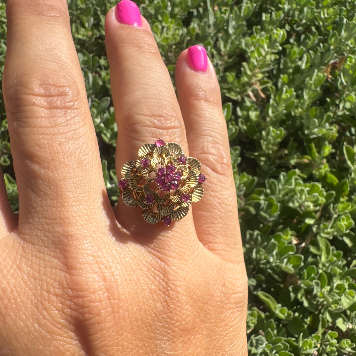 18K gold ring crafted in yellow gold, designed in a layered floral motif set with Rubies