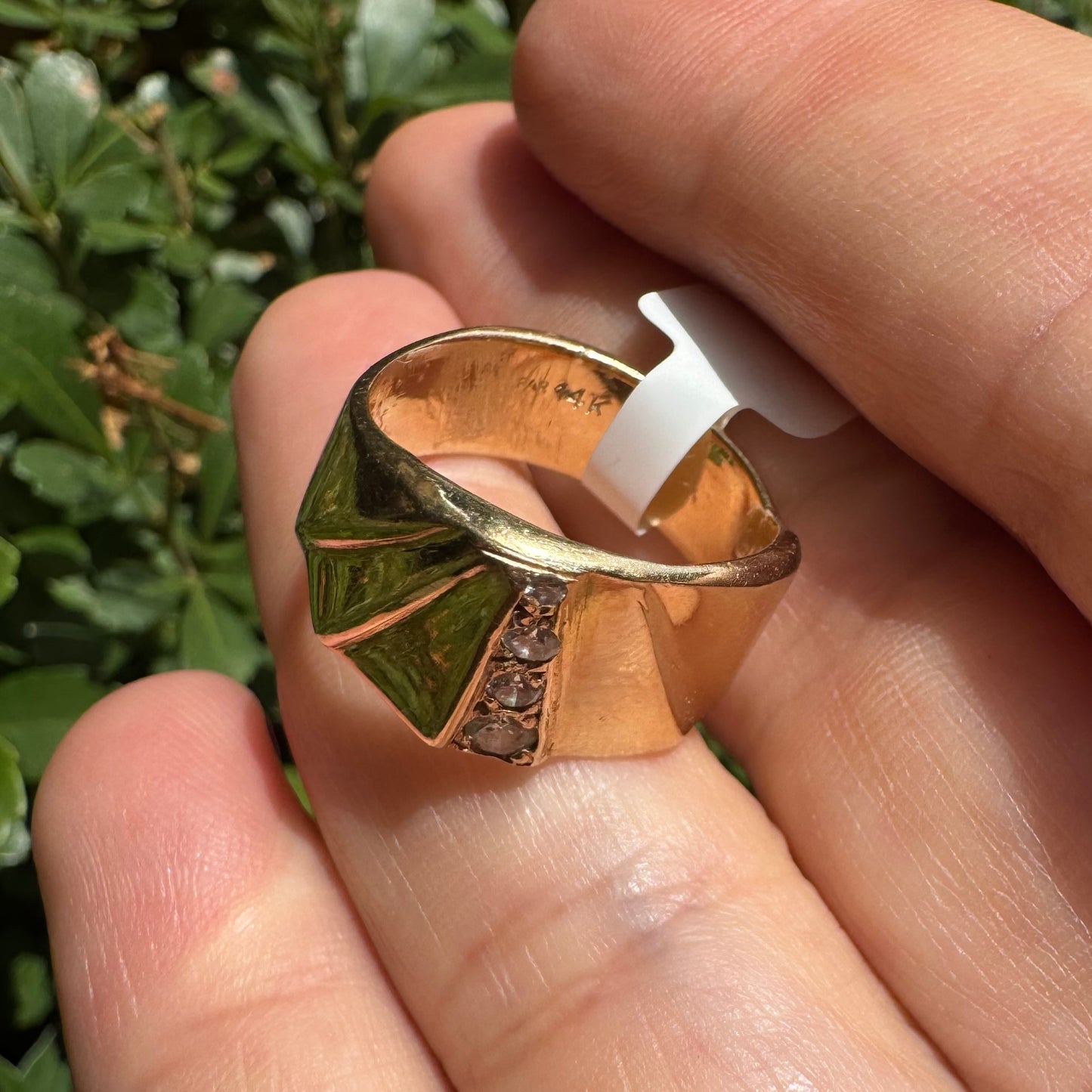 14K gold ring set with Diamonds featuring a fan-like geometric design