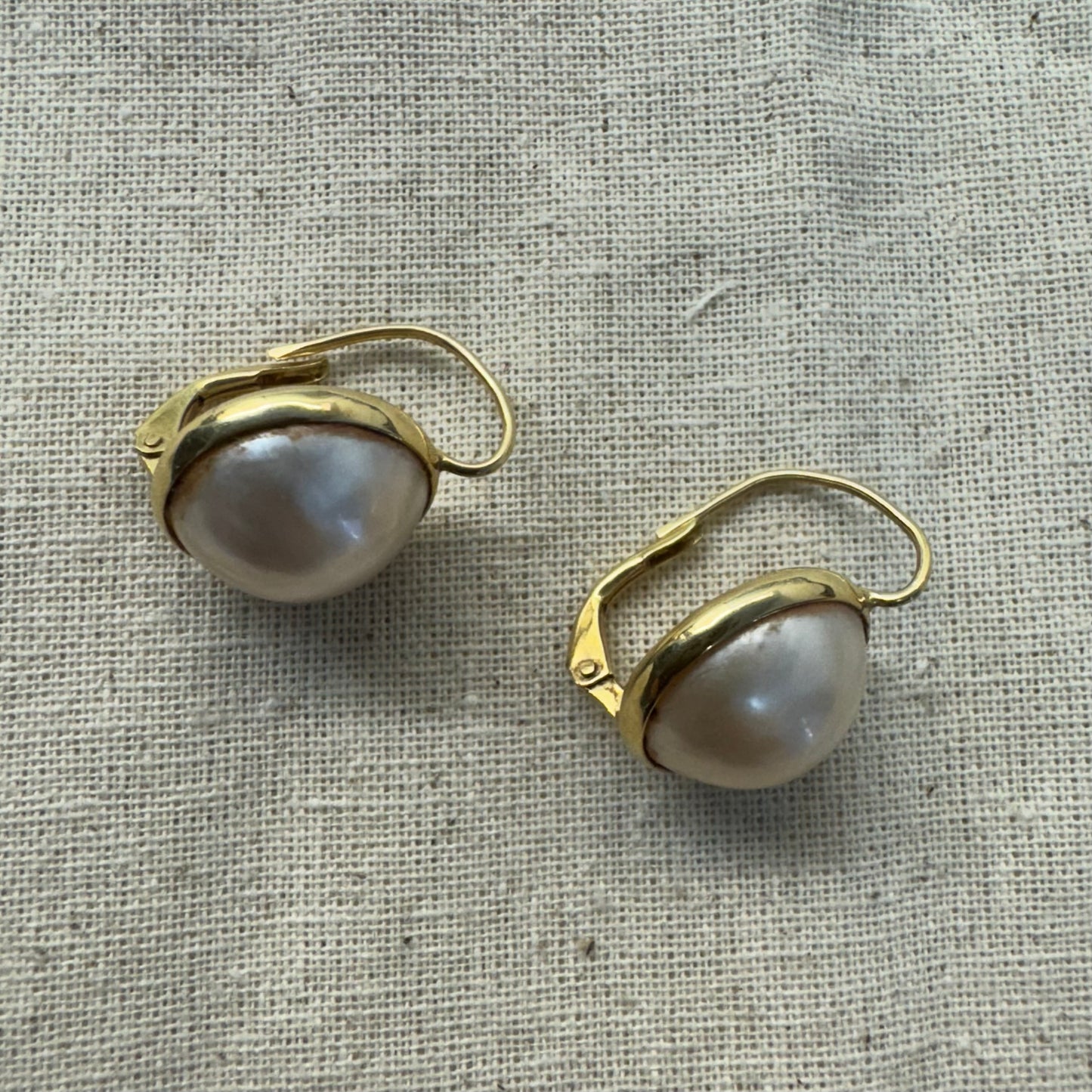 14K gold drop earrings set with flat coin pearls