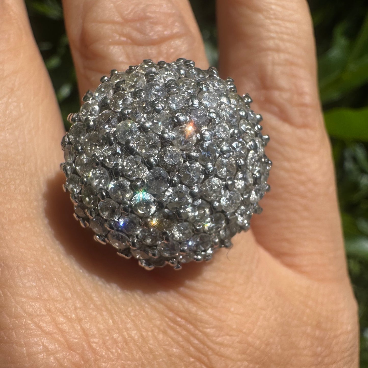 18K gold ring set with Diamonds in a bold pavé setting.