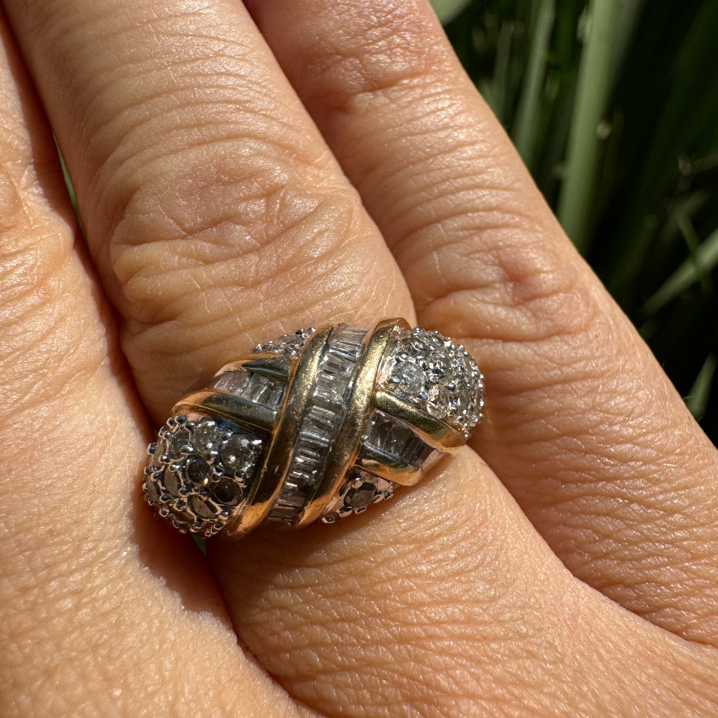 14K gold ring set with crisscrossed rows of baguette and round-cut Diamonds