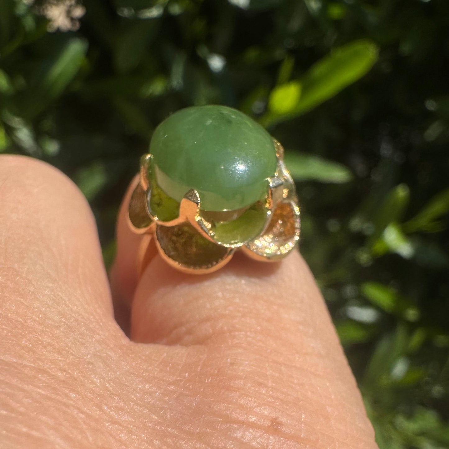 14K gold ring set with a large green Jade cabochon