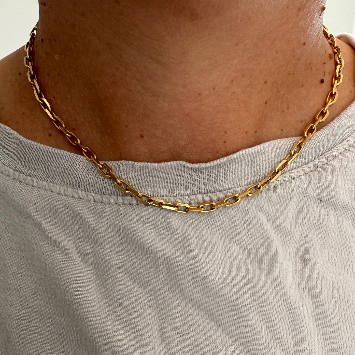 14K gold chain necklace featuring elegant elongated links with a polished finish.