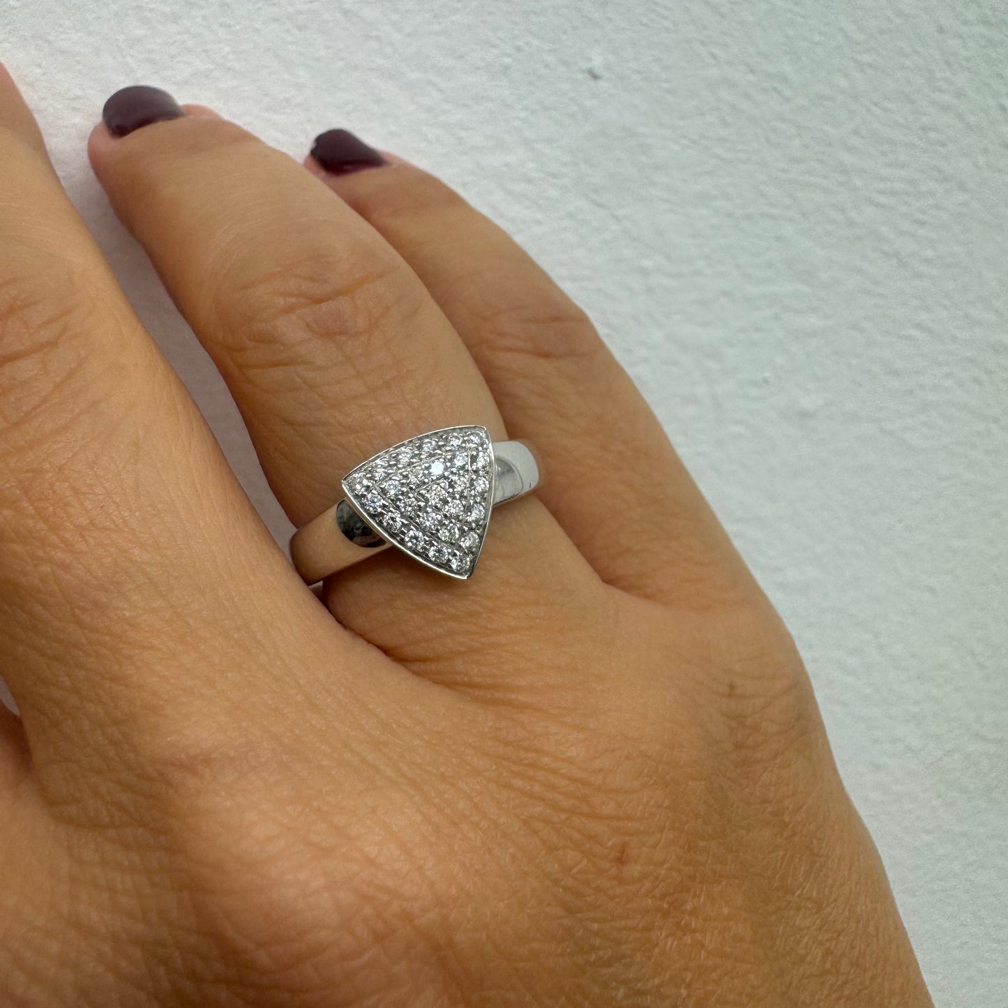 18K gold ring featuring a bold triangular design fully pavé-set with brilliant-cut Diamonds.