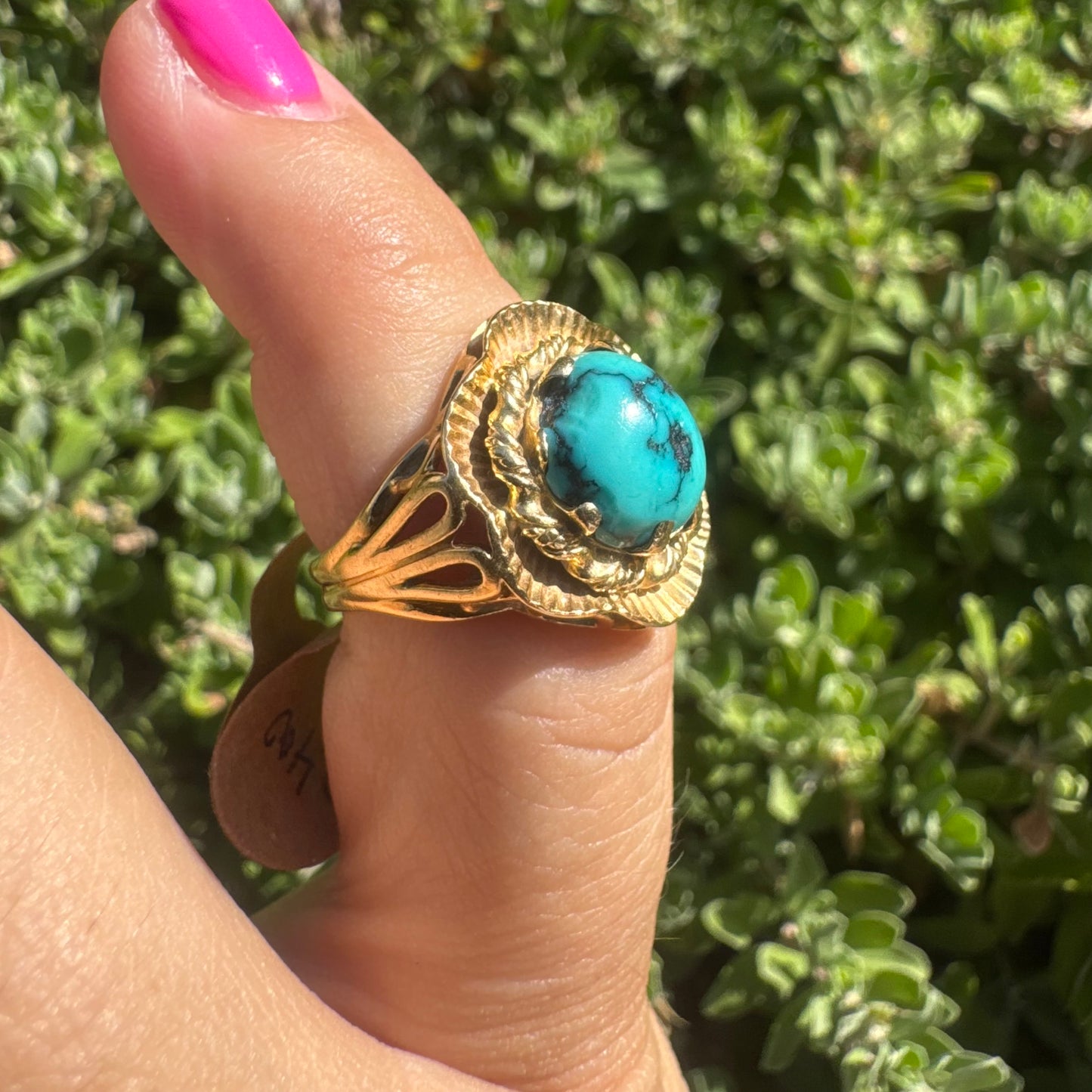 18K gold ring set with a unique Turquoise